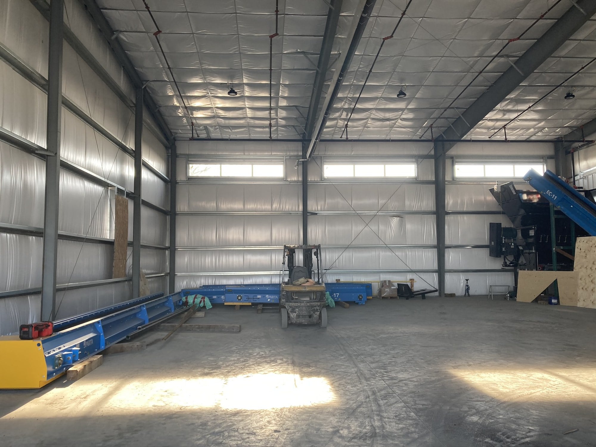 Inside the Ecco Recycling facility in Aldersyde with conveyor lines